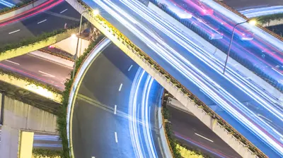 Light traces of traffic at night in a city